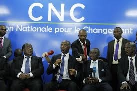 Image de Politique. En effet, suite a une retrusturation au sein de la coalition qui vise a permettre aux candidats a la présidentielle de mieux se concentrer sur la campagne électorale, les dirigeants de la coalition viennent de designer le Dr Bah Enoch pour remplacer Charles Ban y au poste de chef de la coalition. Nous espérons juste que le motif avancé est vrai et qu'il ne cache pas un problème au sein du groupe qu'on n’essayerait de cacher.